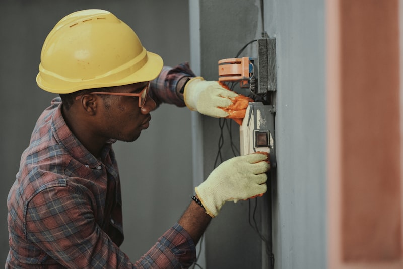 Master electrician at work on residential panel